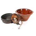 A large Victorian terracotta dairy bowl, a copper pan and an early electric heater. Largest H28cm.