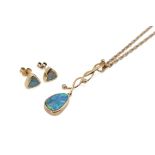 An opal pendant and pair of earrings.