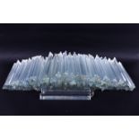 Two boxes of crystal glass chandelier rods of triangular form.