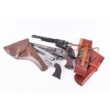 Two MGC replica model 1874 blank firing Colt single action army pistols and another replica.