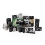 A mixed collection of film and digital cameras.
