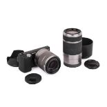 A Sony NEX 5 Mirrorless Digital Camera Outfit. Black. With two lenses; a Sony 18-55mm f3.5-5.