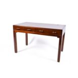 A 20th century Heal's mahogany writing table desk of rectangular form.