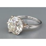An old cut diamond solitaire ring, the claw set stone weighing approximately 3.6 carats in white
