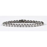An 18 ct white gold natural diamond tennis bracelet, diamond weight 16.17 carats.