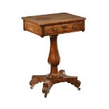 A William IV mahogany work table, fitted with a single drawer raised on a faceted column with