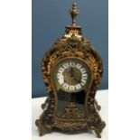 An early 20th Century boullework blonde tortoiseshell and brass inlaid mantel clock in the Louis XV