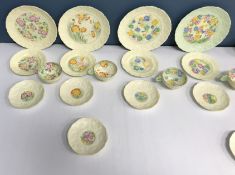 A Paragon flower handled part tea service comprising three green-handled cups,
