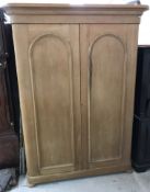 A Victorian pine wardrobe compactum,