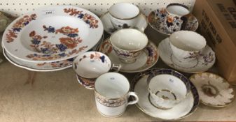 A collection of 19th Century English tea cups and saucers including a bat printed example depicting