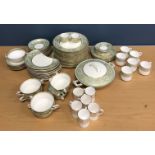 A Royal Doulton Embassy part dinner service comprising 7 twin handled cups and 10 saucers,
