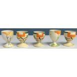 Two Clarice Cliff "Bizarre" geometric design hand-painted egg cups by Wilkinson Ltd,