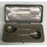 A pair of George V Arts & Crafts silver spoons,