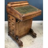 A Victorian walnut and inlaid Davenport desk,