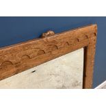 A Robert "Mouseman" Thompson of Kilburn English oak landscape mirror with penny moulded top and