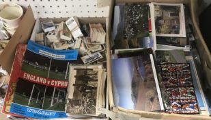 A box of various ephemera including World War I period and other postcards,