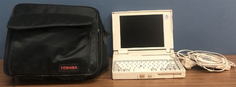 A circa 1994 Toshiba T4900CT laptop computer (featuring Intel Pentium Processor and colour active