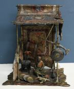 A circa 1900 cold painted bronze figure group in the manner of Franz Bergmann as 