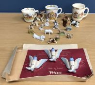 A box of various china wares including a set of three Wade porcelain swallows,