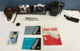 A Minox B mini camera with leather pouch and belt chain,