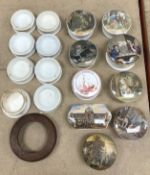 A collection of eight Victorian transfer decorated pot lids with bases to include 
