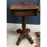 A Victorian mahogany pedestal work table with single fitted drawer on a turned and ringed column to