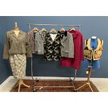 A collection of vintage clothing to include a brown 1950s swing style jacket,