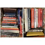 A collection of assorted modern coffee table books on various motor sports and cars to include