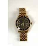 A Rolex 18 carat gold cased GMT Master Oyster perpetual date superlative chronometer,