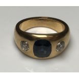 A gent's yellow metal mounted (probably 18 carat gold) sapphire and diamond dress ring,