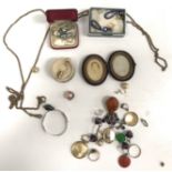 A collection of various costume jewellery including a yellow metal pendant vinaigrette (cover