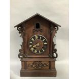 A 19th century cuckoo clock of chalet form, the 8-day movement striking on a gong and cuckoo,