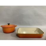 A Le Creuset two-handled casserole and lid, 29.5cm over handles x 10.5cm high, together with a