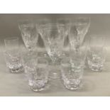 A part suite of Waterford Arden Enis table glass including four white wine glasses, 22cm high,