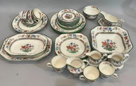 A quantity of Copeland Spode Chinese Rose including three teacups and saucers, two milk jugs, a