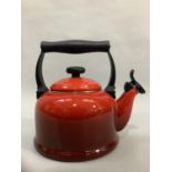 A Le Creuset whistling kettle in red, 2.1l