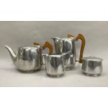 A Picquot ware tea pot, hot water jug, lidded sugar bowl and milk jug