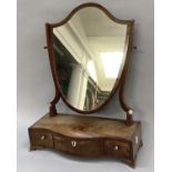 An early 19th century mahogany swing toilet mirror with three drawers