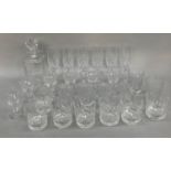A set of six water glasses, six white wine glasses, seven whiskey tumblers of similar design, six