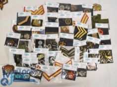 Large collection of British Military Trade Badges: cloth examples to include rank badges and