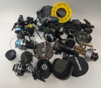 Mixed collection of spinning, fly fishing and sea fishing reels, including Isuzu Charger 1, front