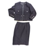 A vintage Chanel Boutique dark navy blue two-piece Skirt Suit, gold trim and button edges, the