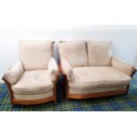 ERCOL 'RENAISSANCE' TWO SEAT SOFA AND MATCHING ARMCHAIR design number 1068, each with curved stick