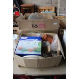 Two boxes of Kitchenalia to include: mugs, glasses, a wine cooler, tins, cutlery, scales, etc.