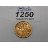 A 1911 Gold Half-Sovereign.