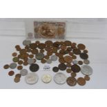 A quantity of mixed coins to include: 1933 half-crown, £5 millennium coin, half pennies, pennies,