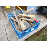 Crate of hammers and mallets.