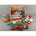 A collection of Dinky, Corgi, Tonka and other playworn toys; Including diecast cars, trucks, tanks -