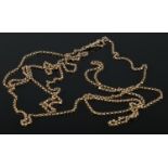 A 9ct gold guard chain. Length approximately 58 inches. 17.9g.