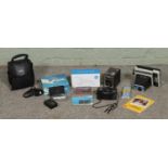 A box of cameras, binoculars and photographic accessories. To include Vivitar Vivicam and